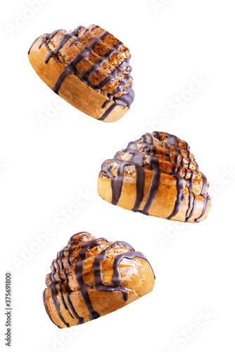 Roll bun with chocolate glaze on a white isolated background