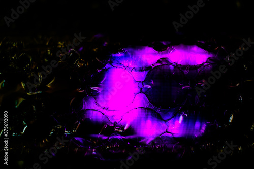 abstract background created with a colorful image through a sheet of plastic bubble wrap © Roberto Sorin