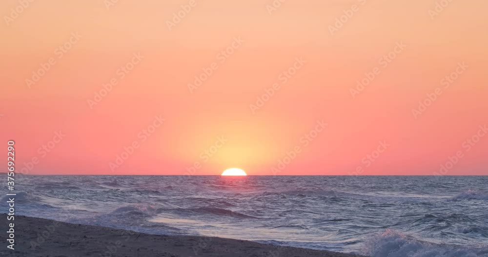 Beautiful red sunrise in the sea or ocean Beautiful red sunrise in the sea or ocean