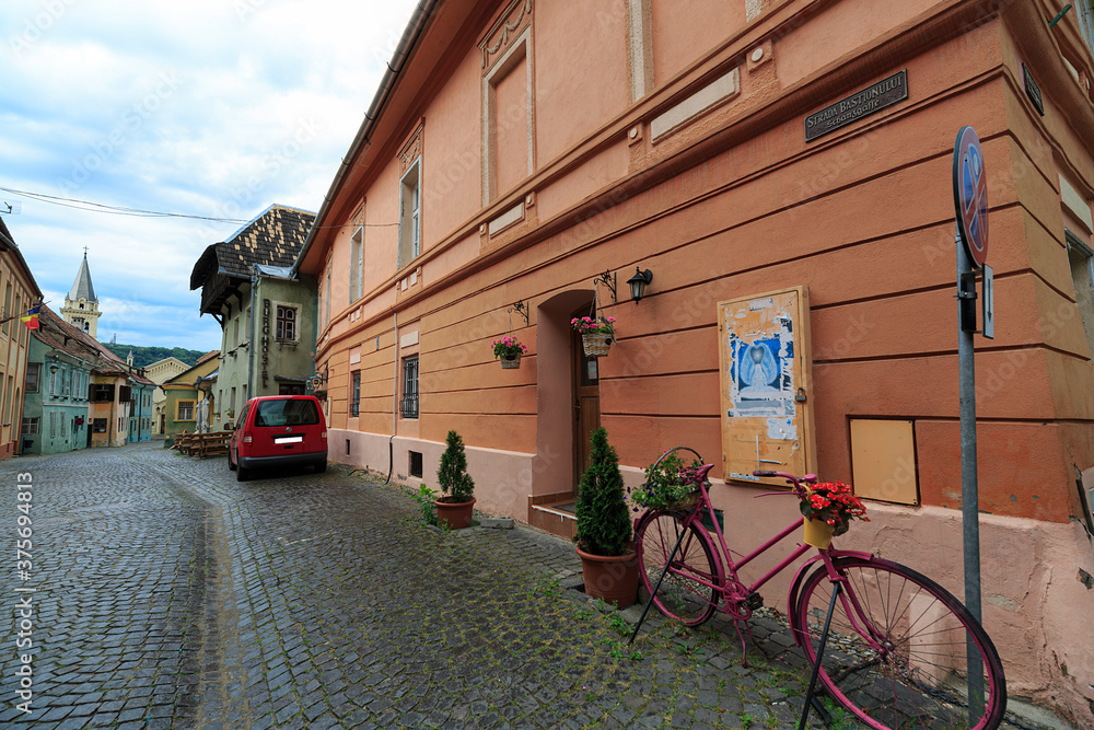 Fototapeta premium Sighisoara; Romania, 7,2019: town founded in the 12th century by the Saxons who came from Germany during the high Middle Ages. Today it is a World Heritage Site.