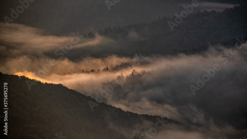 Sunrise over the mountain forest. Bieszczady National Park. Carpathian Mountains. Poland.