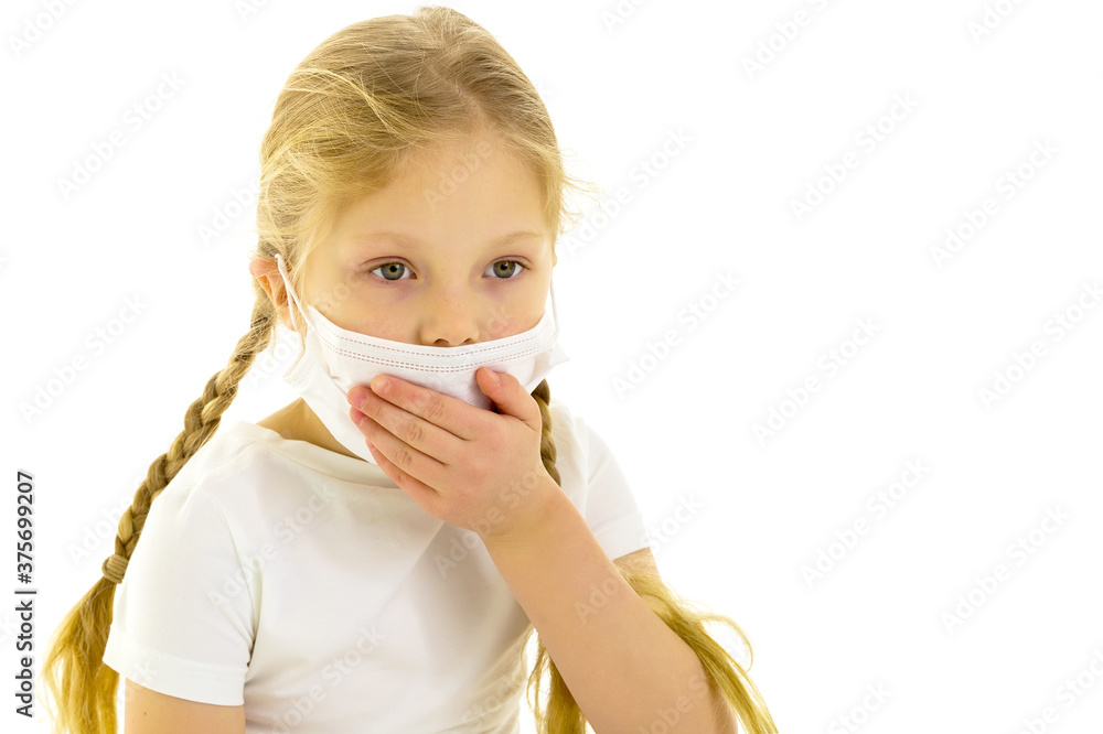Little girl in a medical mask. Disease concept, covid-19. Little girl in a medical mask. Disease concept, covid-19.