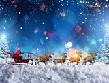 Santa claus in a sleigh ready to deliver presents with sleigh