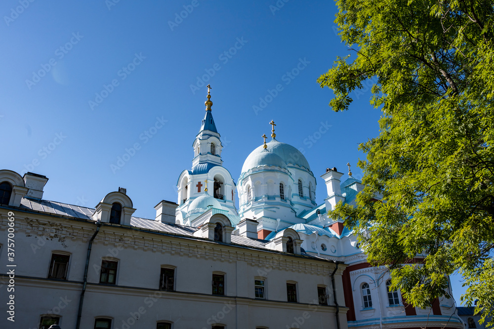 Obraz premium summer views of architectural ancient buildings on the pilgrim island on Lake Ladoga