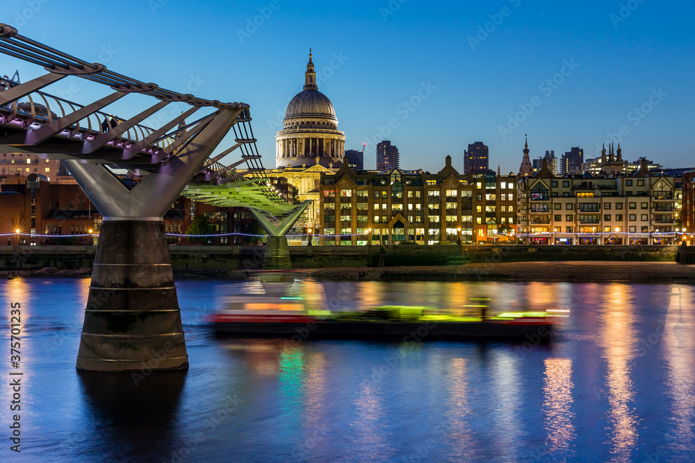 St Paul's Cathedral and the Millennium Bridge in London at night