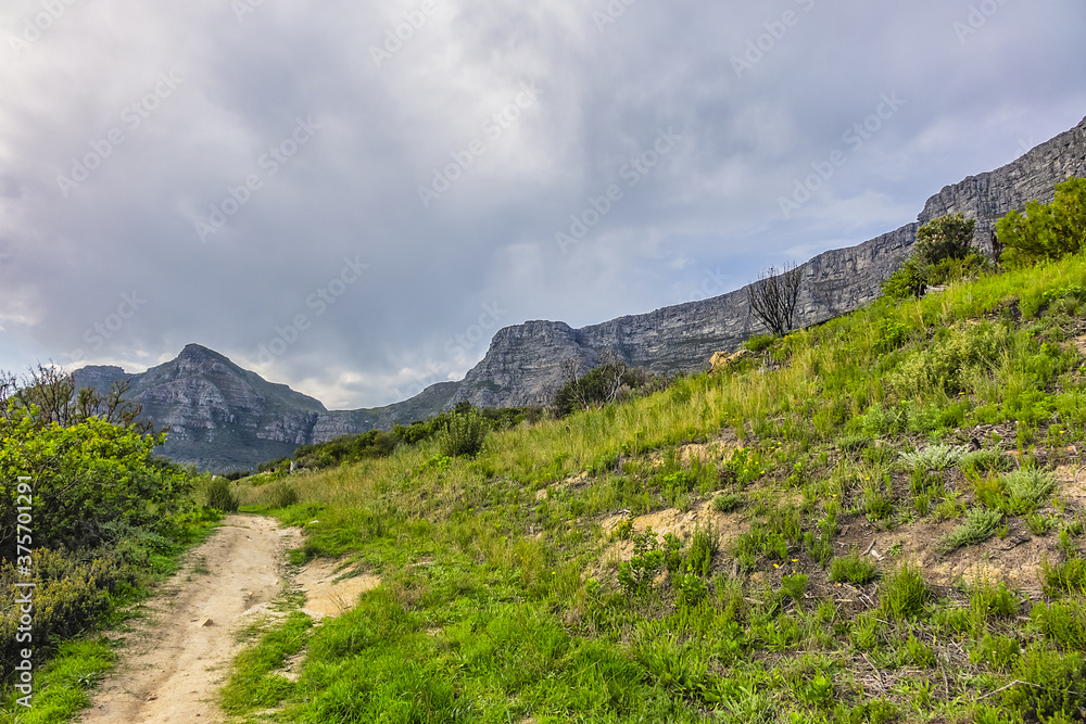 Table Mountain overlooking the city of Cape Town, South Africa. Table Mountain is the most iconic landmark of South Africa.