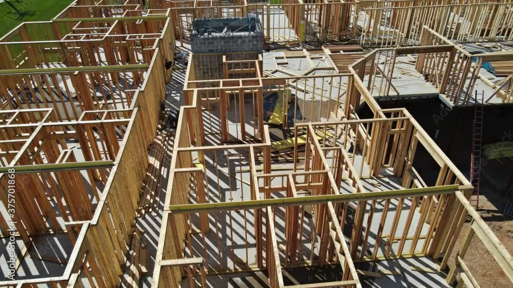 Framing structure wood frame of wooden houses home new stick built home under construction Framing structure wood frame of wooden houses home new stick built home under construction