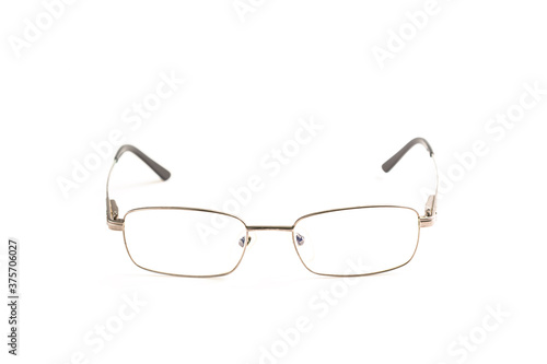 Metal framed glasses on white background.