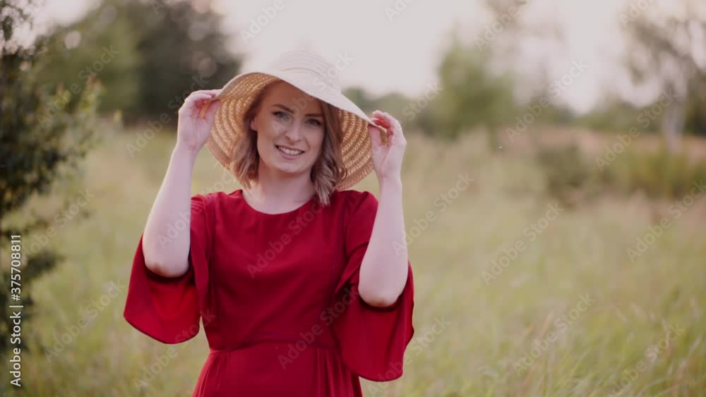 Smiling Woman Wearinh Hat, Laughing and Looking into Camera Smiling Woman Wearinh Hat, Laughing and Looking into Camera