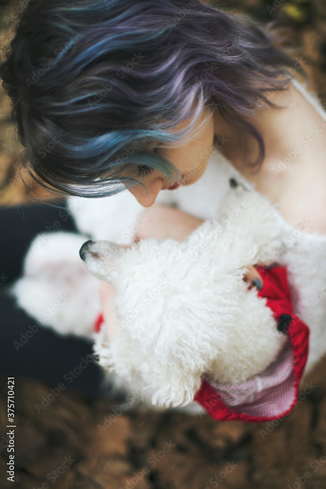 Portrait of a young woman and a dog Portrait of a young woman and a dog