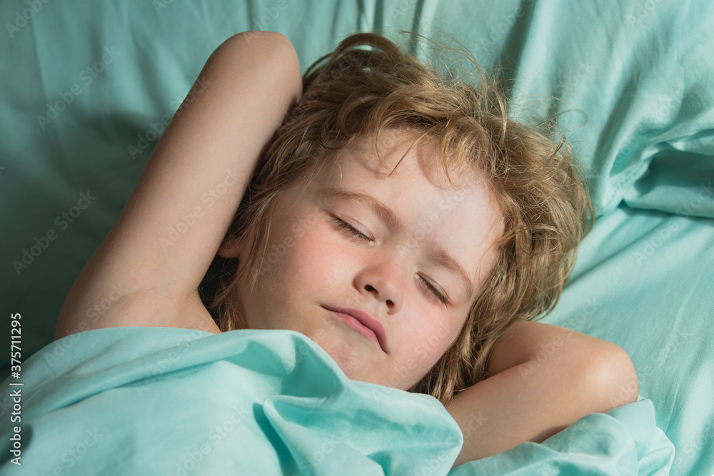 Kids sleep on bed. Small Child rest asleep enjoy good healthy peaceful sleep or nap. Kids sleep on bed. Small Child rest asleep enjoy good healthy peaceful sleep or nap.