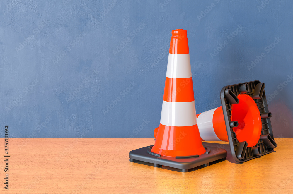 Two Road Cones on the wooden table. 3D rendering Two Road Cones on the wooden table. 3D rendering