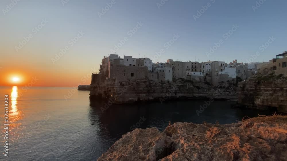 Video of the sunrise of Polignano a mare, Puglia, Italy. Cliff overlooking the sea Video of the sunrise of Polignano a mare, Puglia, Italy. Cliff overlooking the sea