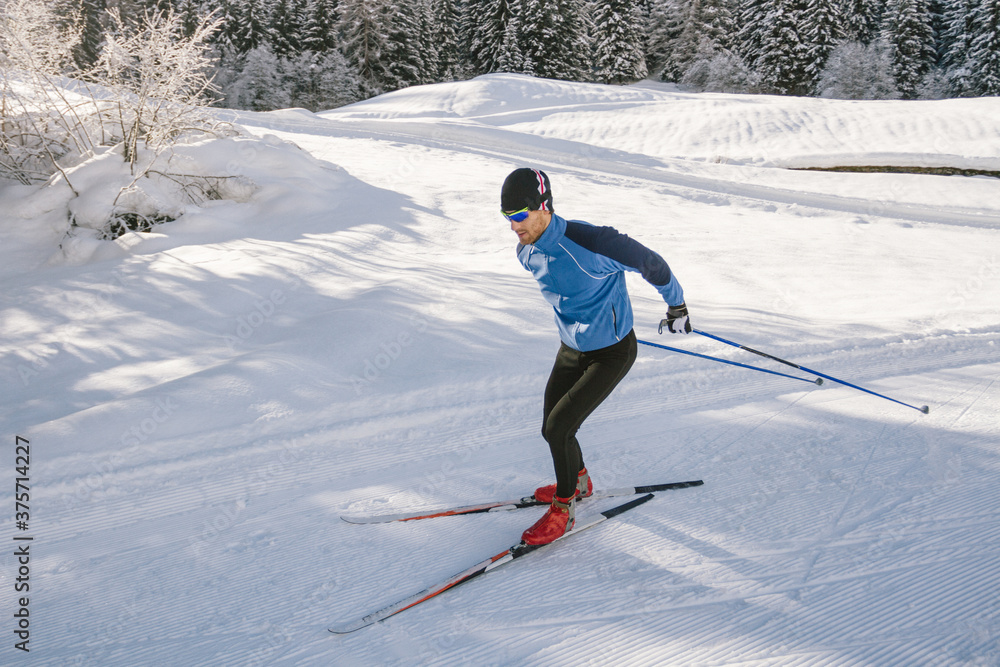 Athlete practice cross-country skiing Athlete practice cross-country skiing