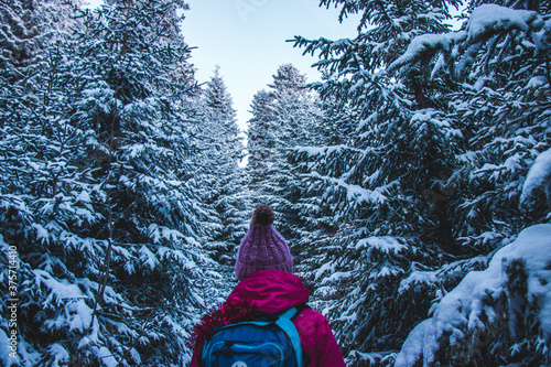 Woman walking in a forest