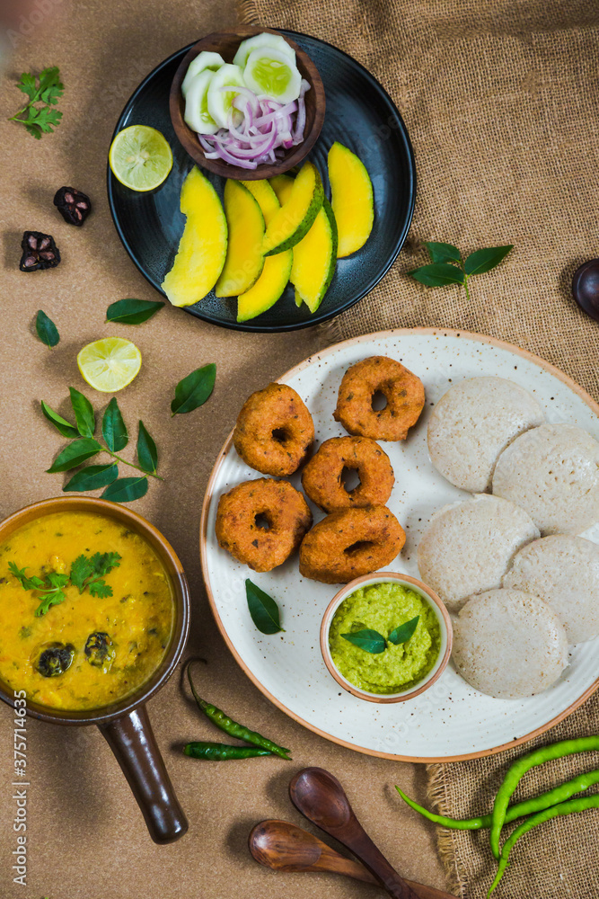 Top view of Idli, Wada, Sambar and Chutney. Traditional South Indian