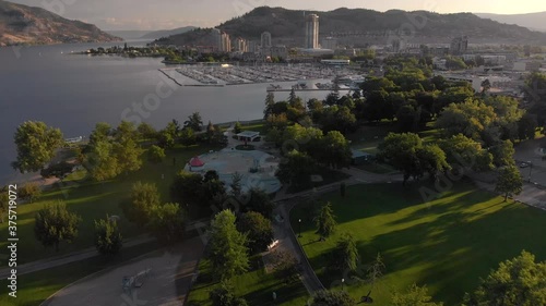 Aerial footage of Downtown Kelowna on Lake Okanagan at sunrise with beautiful light. 4K 24FPS. photo