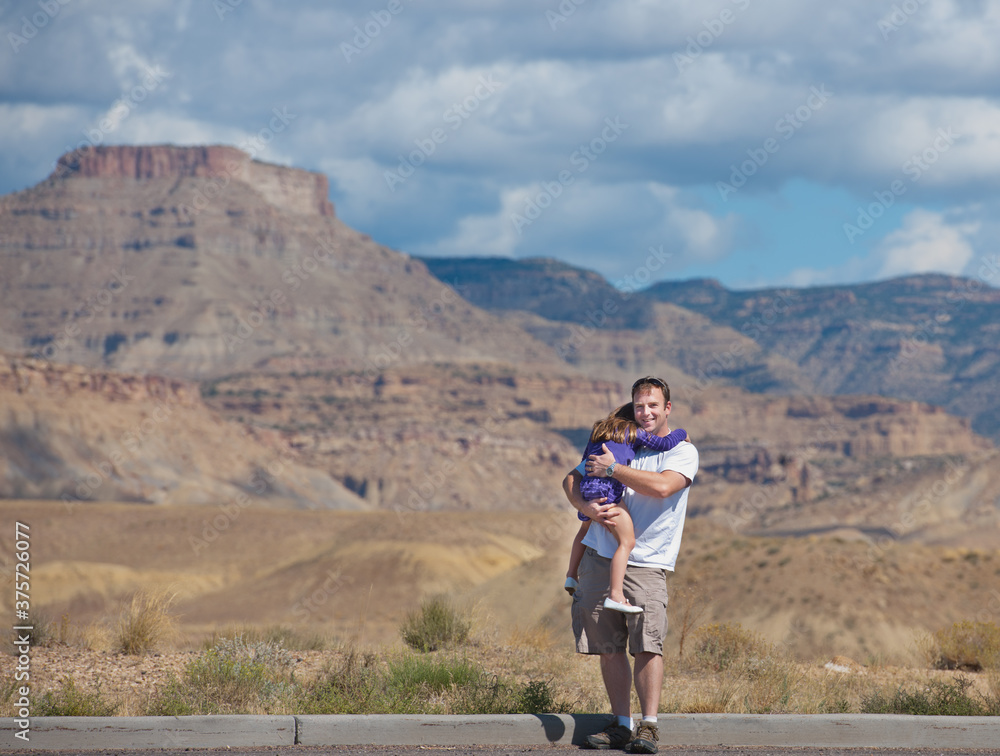 Western Road Trip: Father Holds Sleeping Daughter At Rest Stop V Western Road Trip: Father Holds Sleeping Daughter At Rest Stop V