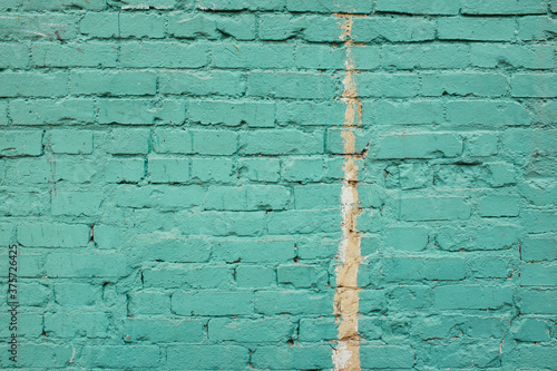 Painted brick wall, close up photo