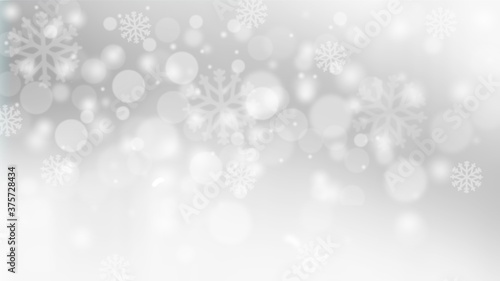 Gray abstract christmas background with white snowflakes bokeh stars blurred beautiful shiny light  use for card new year wallpaper backdrop 