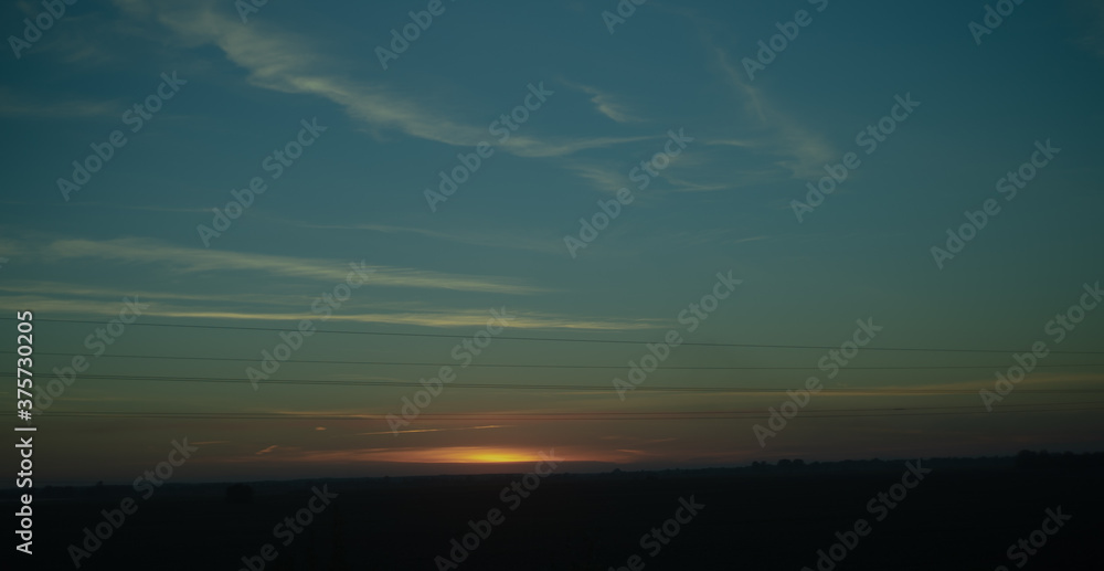 Obraz premium clouds over sunset