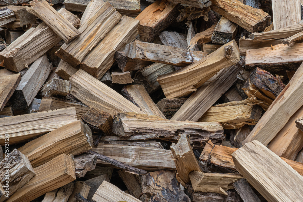 pile of split firewood not stacked pile of split firewood not stacked
