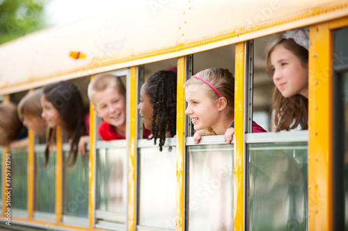 School Bus: Kids Peering Out Bus Window photo