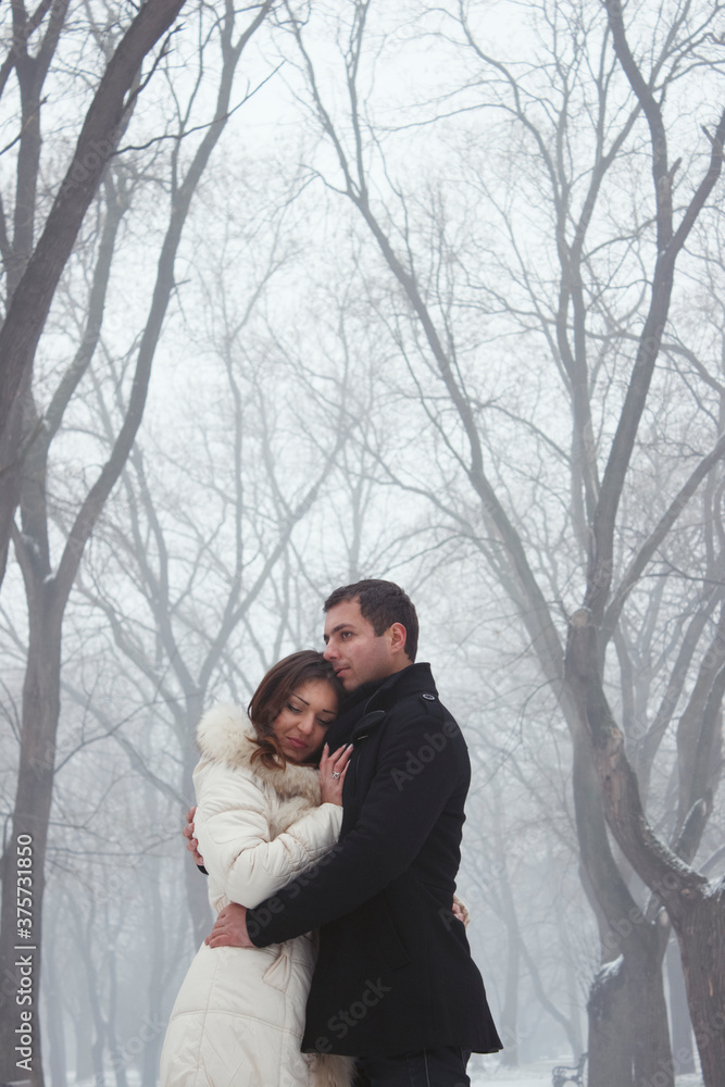 Happy loving couple in park Happy loving couple in park