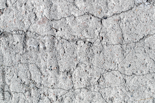 Background, texture, concrete of the old floor with cracks.