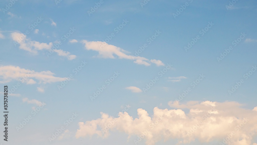 Partly cloudy with blue sky. White clouds on a blue sky.