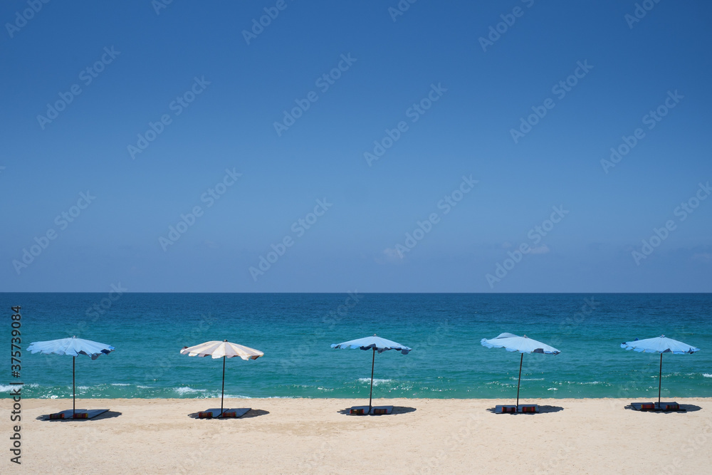 Parasols on the Sandy Beach Parasols on the Sandy Beach