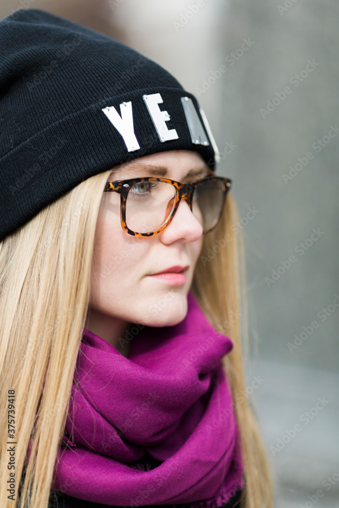 young woman with glasses and black hat young woman with glasses and black hat