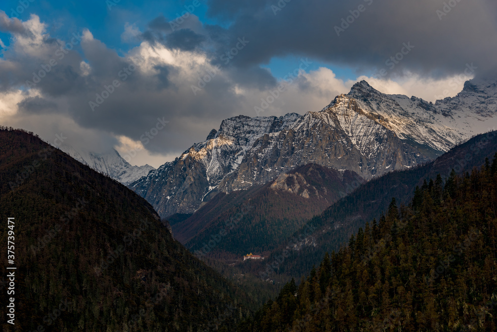 sunrise in the mountains in Yading national reserve