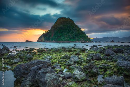 View of Red island beach in Banyuwangi in Indonesia. Java popular travel destination. Summer holiday background. photo