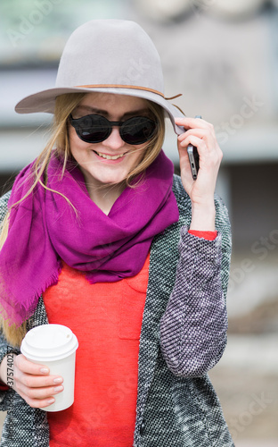 real happy young woman on the street photo