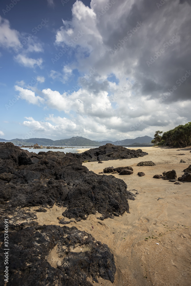 View of Red island beach in Banyuwangi in Indonesia. Java popular travel destination. Summer holiday background. View of Red island beach in Banyuwangi in Indonesia. Java popular travel destination. Summer holiday background.