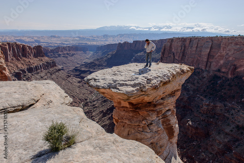 Man stranded on a desert tower contemplates jump