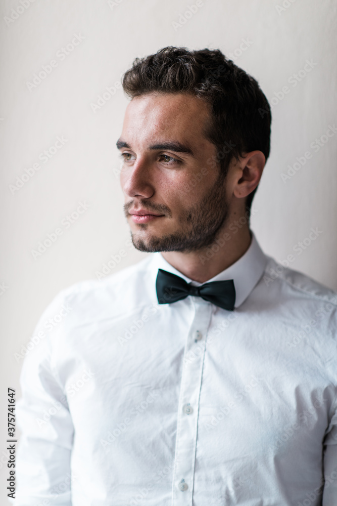 young man with bowtie young man with bowtie