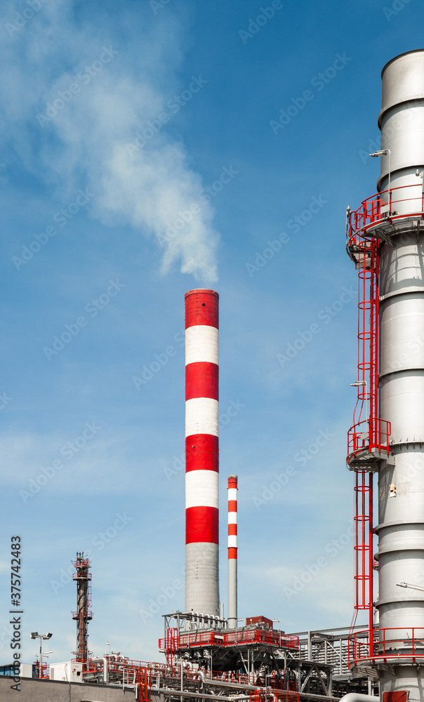 Modern industry complex with power station and environmental pollution / oil refinery Modern industry complex with power station and environmental pollution / oil refinery