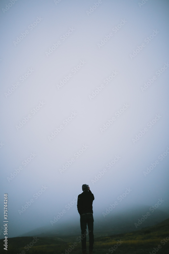 Man Takes iPhone Photo of Foggy Hills Man Takes iPhone Photo of Foggy Hills
