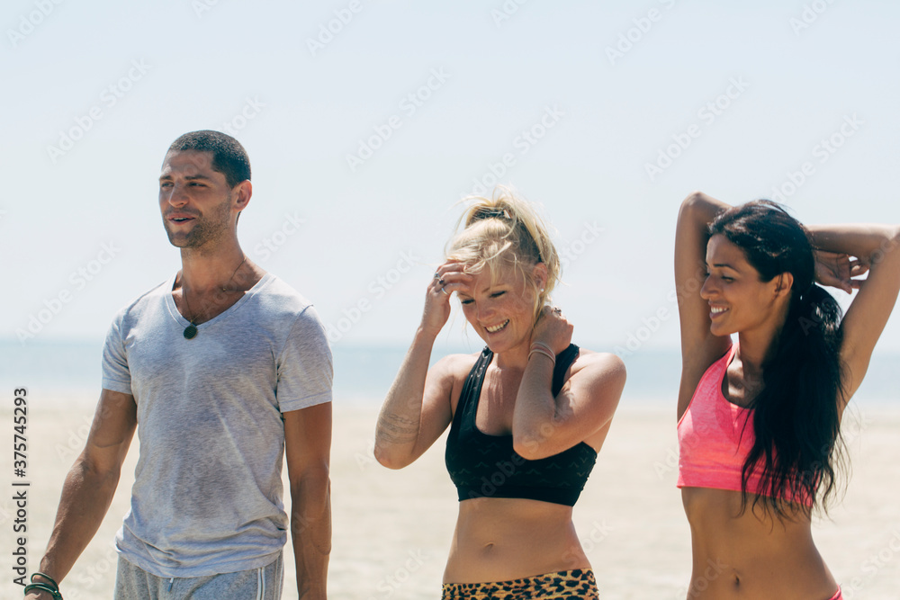 Group of People in Sportswear Ready for an Outdoor Workout Group of People in Sportswear Ready for an Outdoor Workout