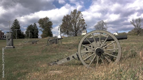Cannon and monument on a Civil War battlefield