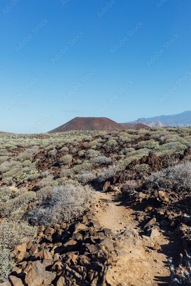 Footpath into a wilderness volcanic area Footpath into a wilderness volcanic area
