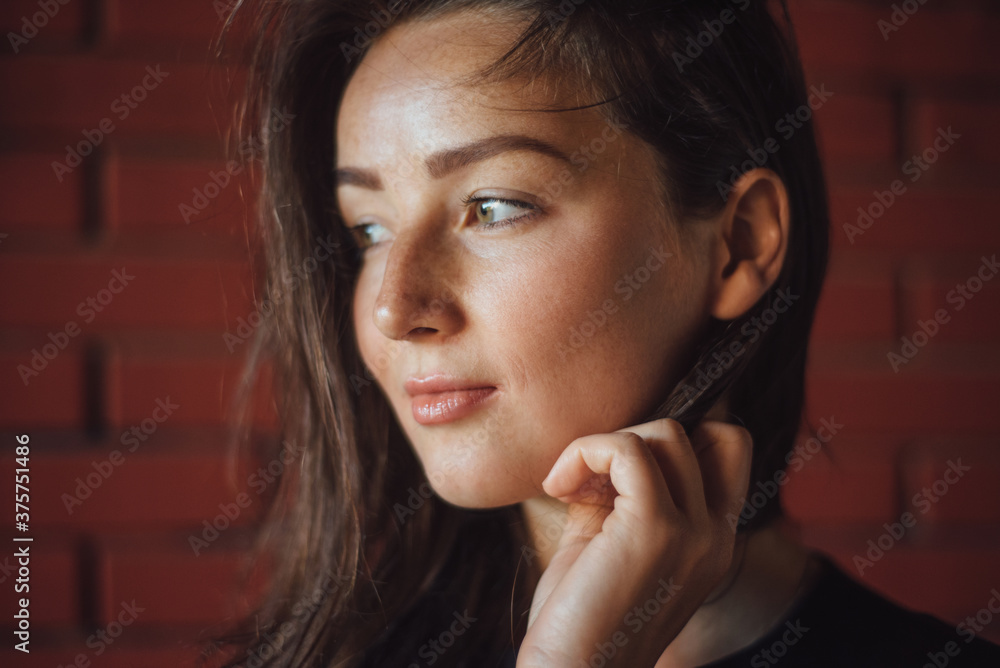 Portrait of beautiful woman against the wall Portrait of beautiful woman against the wall
