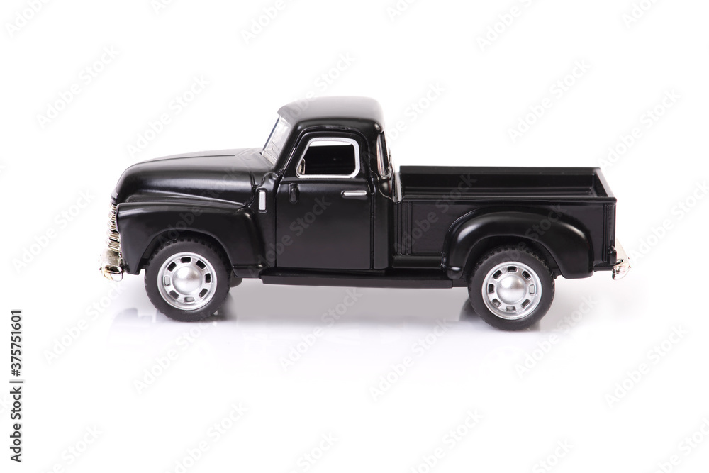 Black old style model pickup truck on white background.