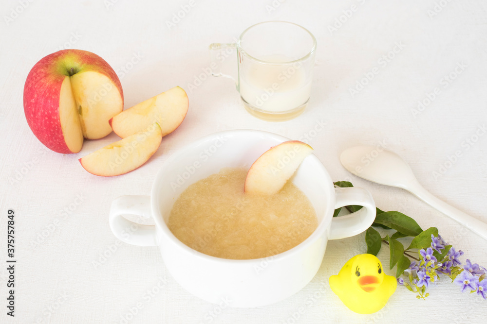 mix apple mashed with milk healthy foods health care for baby eats breakfast arrangement flat lay style on background white mix apple mashed with milk healthy foods health care for baby eats breakfast arrangement flat lay style on background white