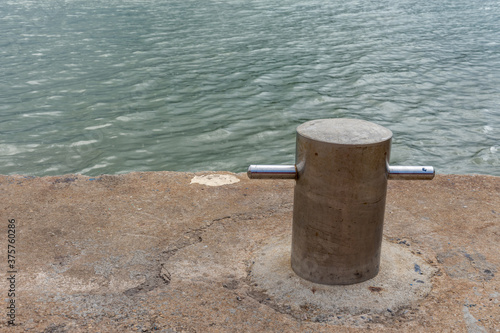 Docking pole to secure the boat, equipment at the harbor