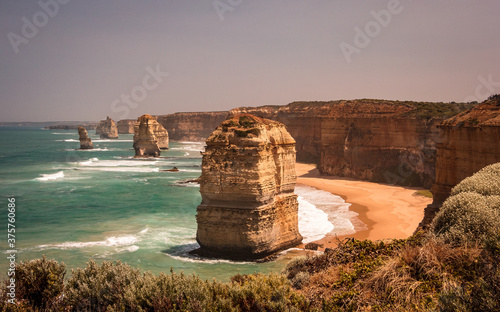 The Twelve Apostles on the Great Ocean Road. Landscape composed of cliffs and rocks on the ocean with natural vegetation.