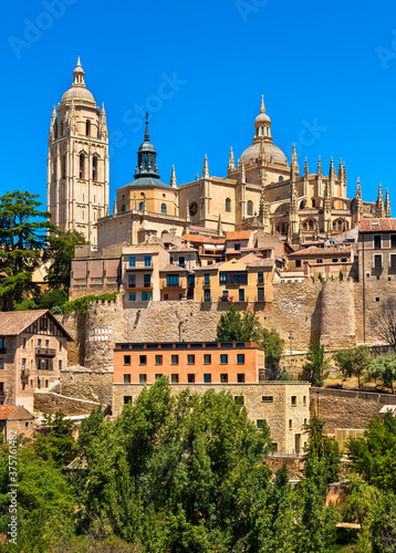 Segovia Spain Roman historic hilltop city town with brilliant cloudless blue sky on sunny summer day