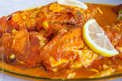 Obraz na plátně Cari de poissons rouges, gastronomie réunionnaise